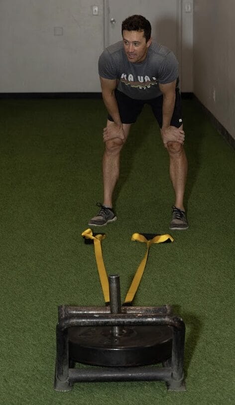 Personal training session in Tucson with coach teaching squat for VO2 Max and strength