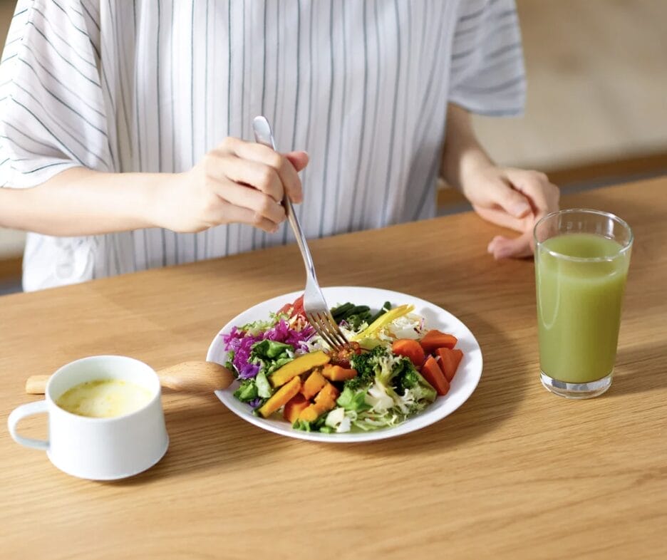 Frustrated person staring at dinner representing restrictive dieting and why most diets fail